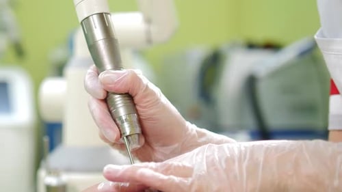 Laser medical procedure performed by doctor in clinic