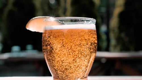 Close up slow motion shot of beer carbonation
