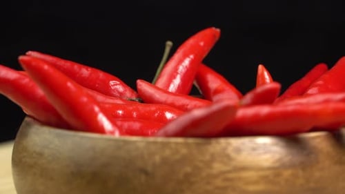 Red Chili Peppers in a Wooden Bowl