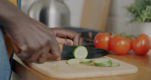 Cucumber Sliced in Bright Kitchen Close Up