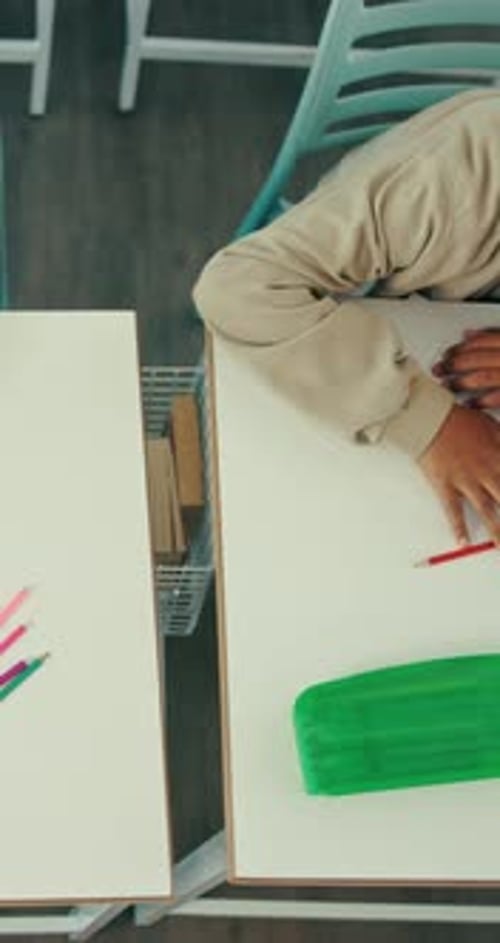 Sleeping, education and bored with children in classroom for study burnout