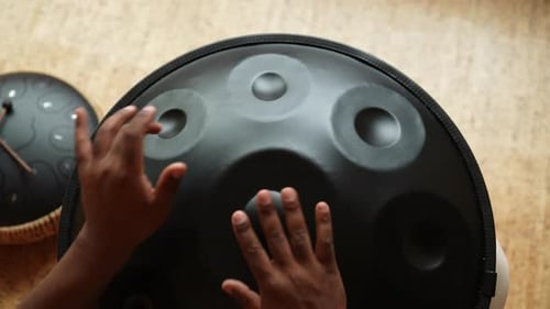 First Person View of Unrecognizable African Drummer Playing Traditional Ethnic Music Using
