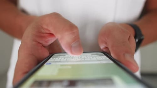 Woman Chatting Online on Smartphone Macro Close Up Typing Text Message Touching Touchscreen Keyboard