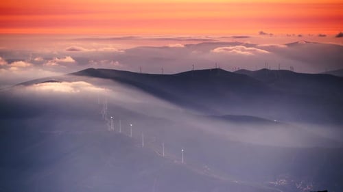 Clouds Over Mountains And Wind Turbines, Portugal.Timelapse