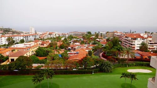Static wide shot of Santa Cruz de Tenerife, Canary Islands. View of the capital and the sea in the d