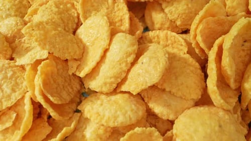 Appetizing corn flakes in macro video