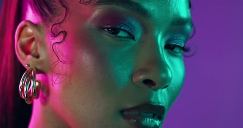 Face, makeup and woman with skincare, neon and dermatology on purple studio background