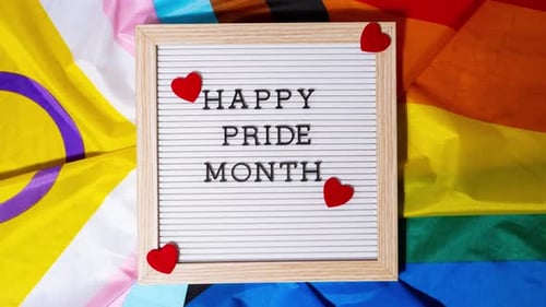 Happy Pride Month Message on Letter Board with Animated Hearts