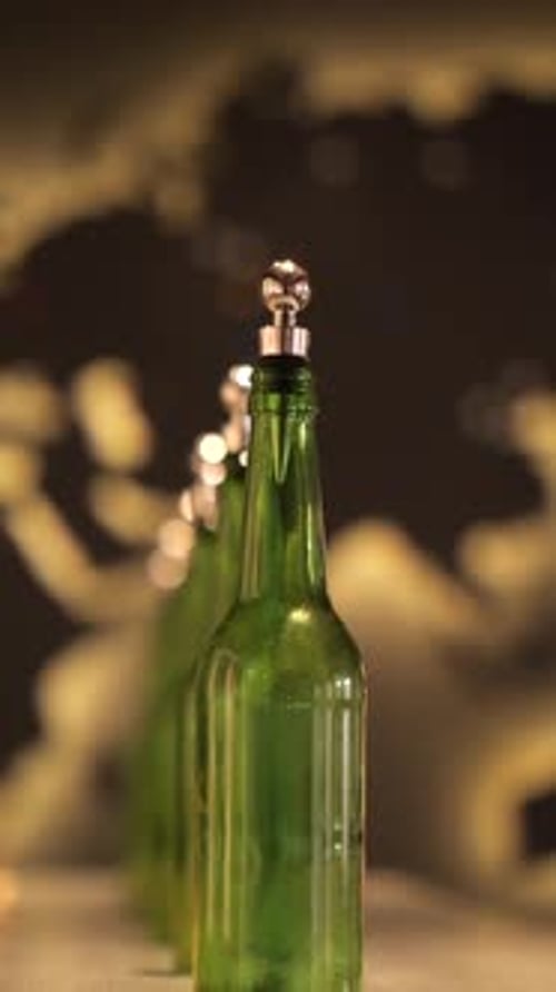 Vertical Video Green Bottles with Silver Caps and Numbered Wooden Sticks