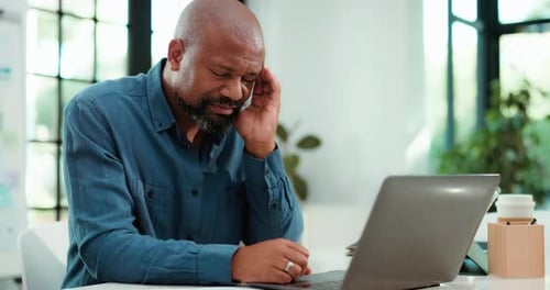 Tired, black man and laptop in office with headache for copywriting mistake