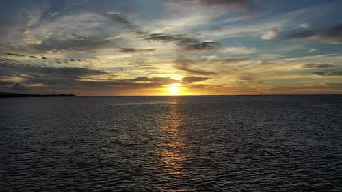 Golden Sunset Over Ocean Horizon