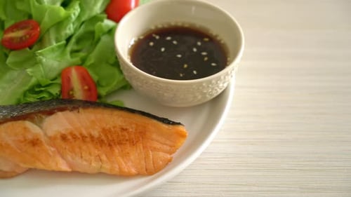 grilled salmon fillet steak with vegetable salad - healthy food style