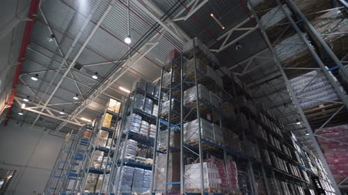 Camera Shot Of Different Materials In Warehouses Racks Indoor Around: Boxes, Pallets, Inventory, ...