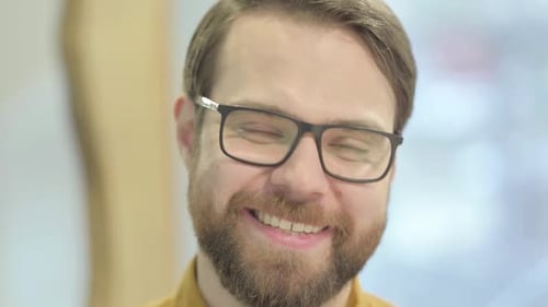 Close Up of Smiling Young Man