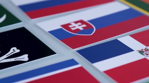 Various National Flags Displayed on White Surface