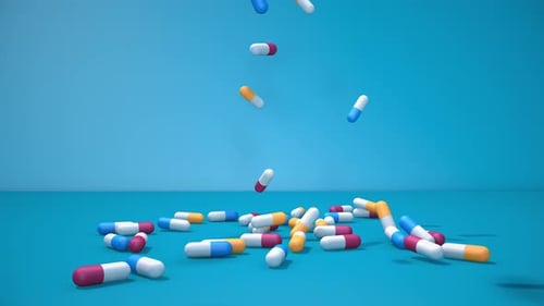 Pílulas médicas caindo no chão
