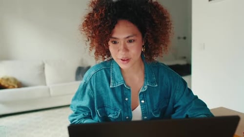 Woman Chatting During Video Conference on Laptop