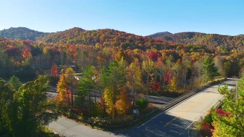 Aerial View of Freeway Overpass Junction with Fast Moving Traffic Cars and Trucks Interstate