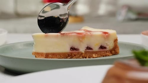 Slice of Sweet Cherry Cheesecake Dessert on Plate