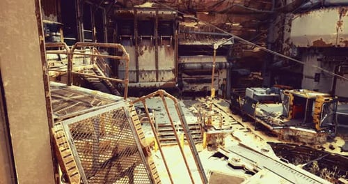 Exploring a Desolate Industrial Site with Rust and Decay in Urban Setting