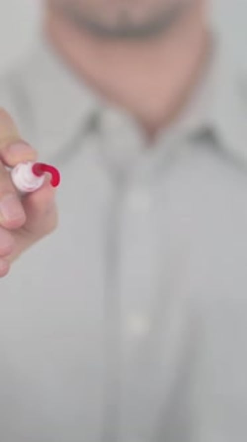 Writing Statistics on Clear Screen with Marker Close Up