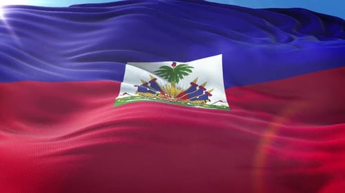 Haiti Flag Waving Under Blue Sky