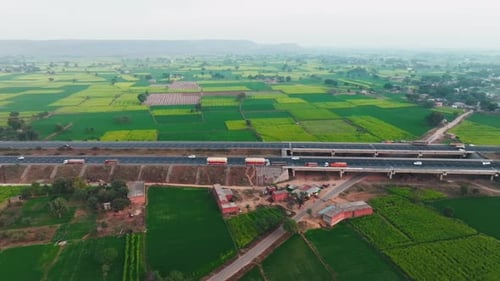 Aerial view of highway and fields, India.