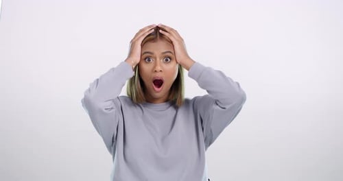 Surprise, wow and face of woman in studio with mistake, fail or oops body language on white
