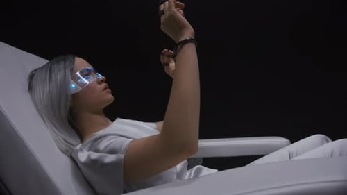 Woman in Futuristic Glasses Using Virtual Interface