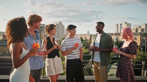 Happy Diverse Friends Enjoying Party Celebration on Rooftop