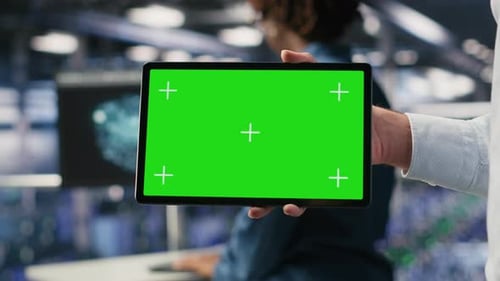 Close Up of Server Room Worker Using Isolated Screen Device