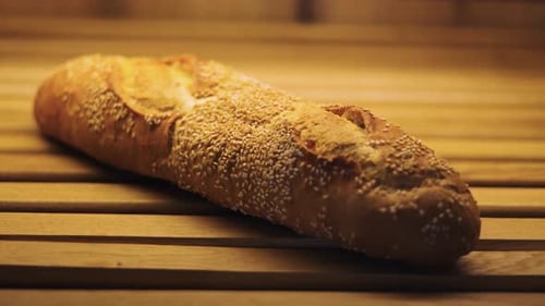 Sesame Seed Baguette on a Wooden Surface