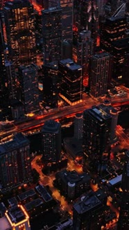 Chicago skyline at dusk showcasing vibrant city lights and traffic