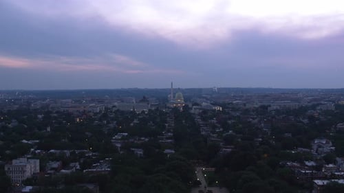 Aerial approach to us capitol building from east capitol street Washington dc evening