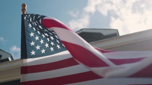 USA flag blowing on the wind, united state of America national flag proudly flying