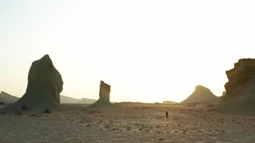 Flying over an amazing rock formation in a nice desert