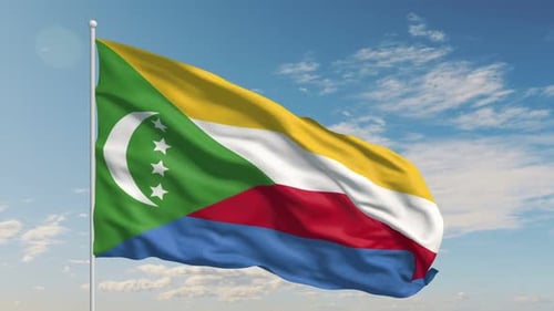 Comoros National Flag Waving in Wind With Blue Sky