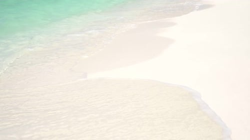 Clean Tropical Sandy Beach and Transparent Sea Waves White Sand and Blue Sea Tropical Island