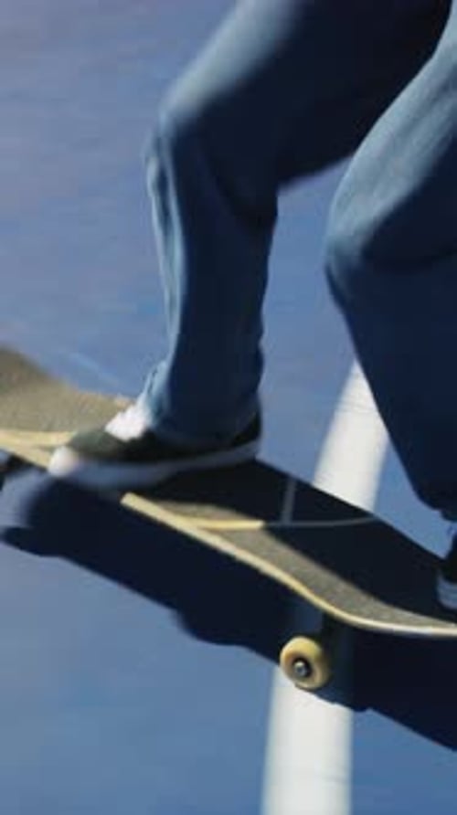 Shoes, skateboard and kickturn on ramp with friends, tricks and balance with riding at urban park