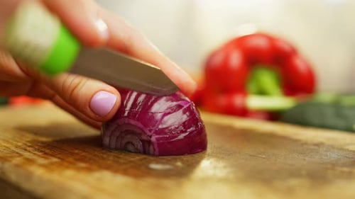 Red Onion Chopped on Cutting Board Close Up