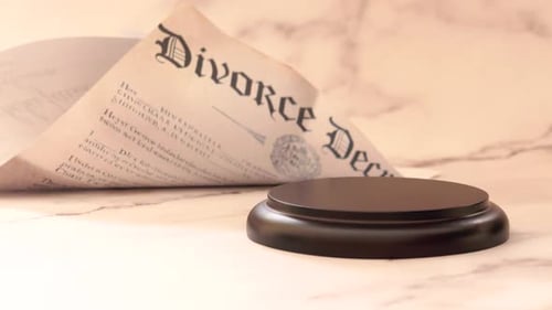 Divorce Decree Document with Judge’s Gavel and Judicial Hammer