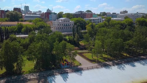 Top View of City Shore with Beautiful Green City in Summer