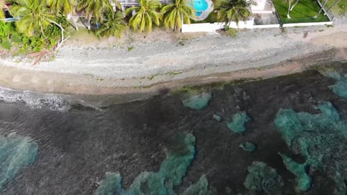 Drone shot hovering over the beach in a southern beach in Puerto Rico.