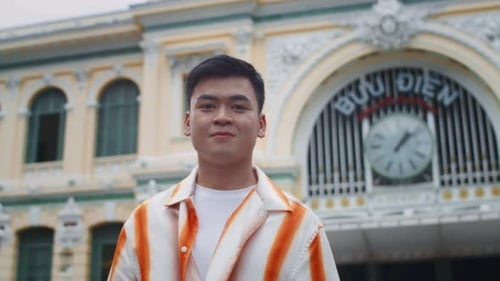 Portrait of Young Asian Man in City Center