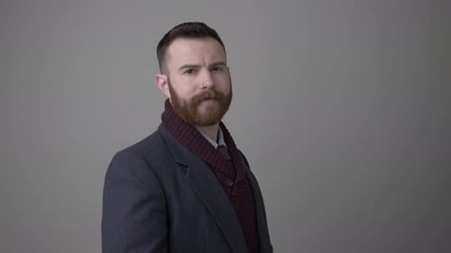 Portrait of Cool Stylish Transgender Man with Beard Adult
