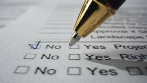 Pen checking no box on a document