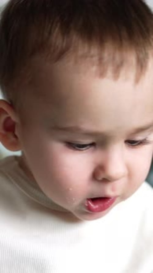 Adorable Infant Eating Close-Up Portrait