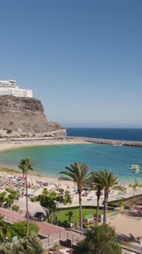 Vertical aerial of idyllic Playa de Amadores resort, Gran Canaria