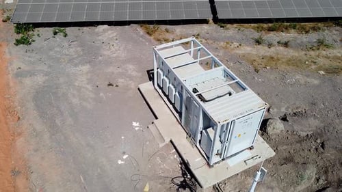 Aerial view of high power inverter station in photovoltaic power plant. Renewable electric energy