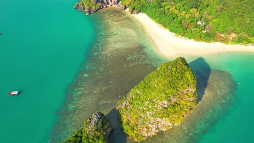 Aerial view from a drone flying over the tropical sea. 4K